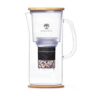 A side view of the ENYA water filter pitcher, showcasing its glass carafe, sustainable bamboo lid, and internal filter cartridge.